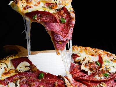 OPS meat lovers pizza with a cheese pull